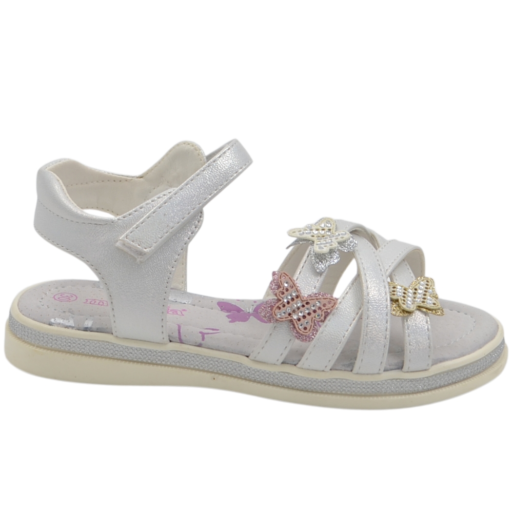 Sandali eleganti da bambina Melania argento laminato con listini incrociati e farfalle 3D glitterate.