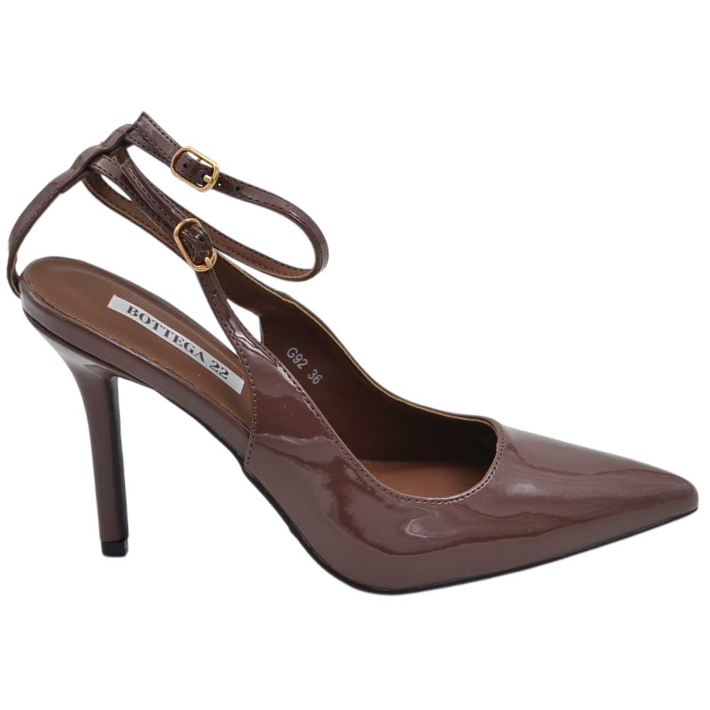 Decollete donna a punta slingback in vernice marrone con gancio oro tacco a spillo 12 chiusura alla caviglia regolabile.