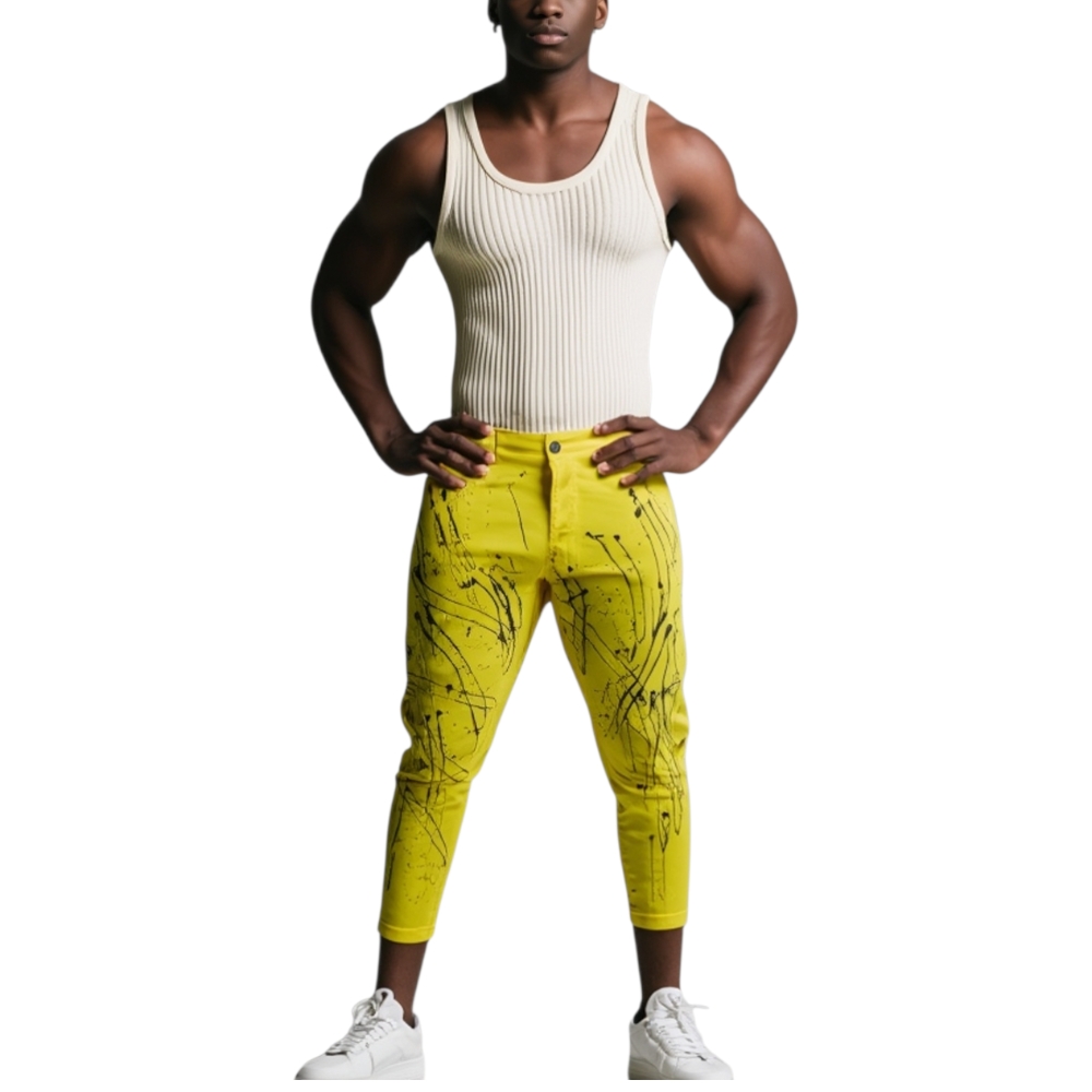 Jeans slim fit color giallo, schizzi di colore nero chiusura con cerniera glamour