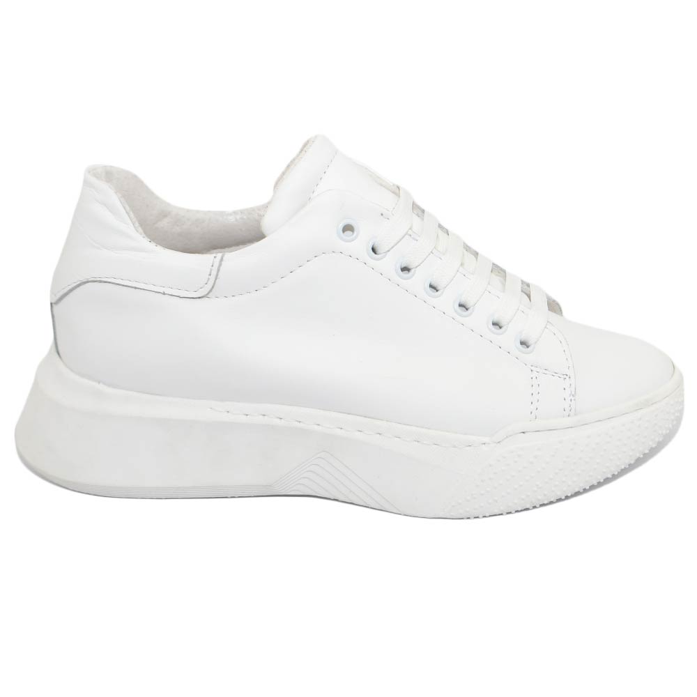 Sneakers uomo in vera pelle liscia di nappa bianco fondo alto asimmetrico gels moda street made in italy ragazzo.