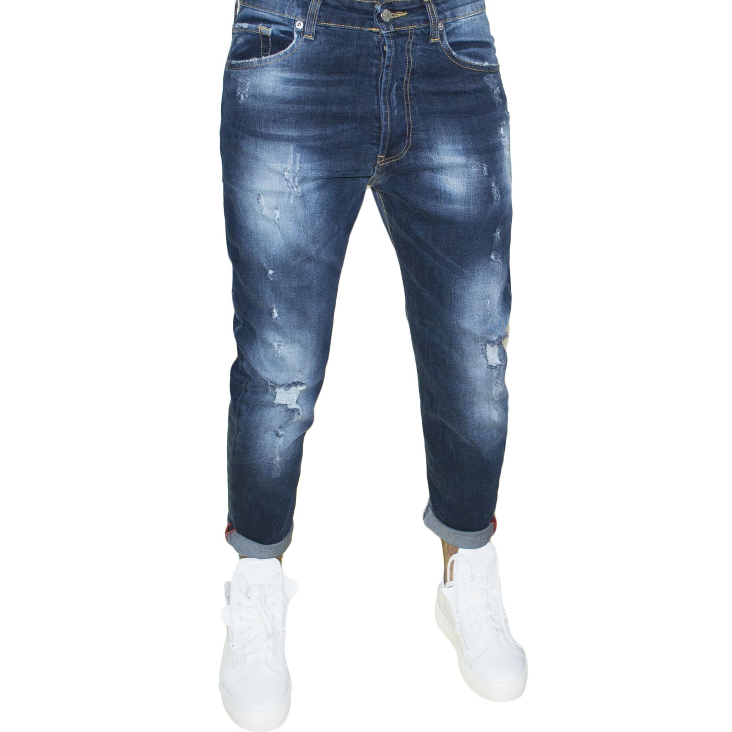 Pantaloni denim 9023 raw edge Skinny fit. Chiusura con bottone e cerniera. Cinque tasche. Strappi sul ginocchio.