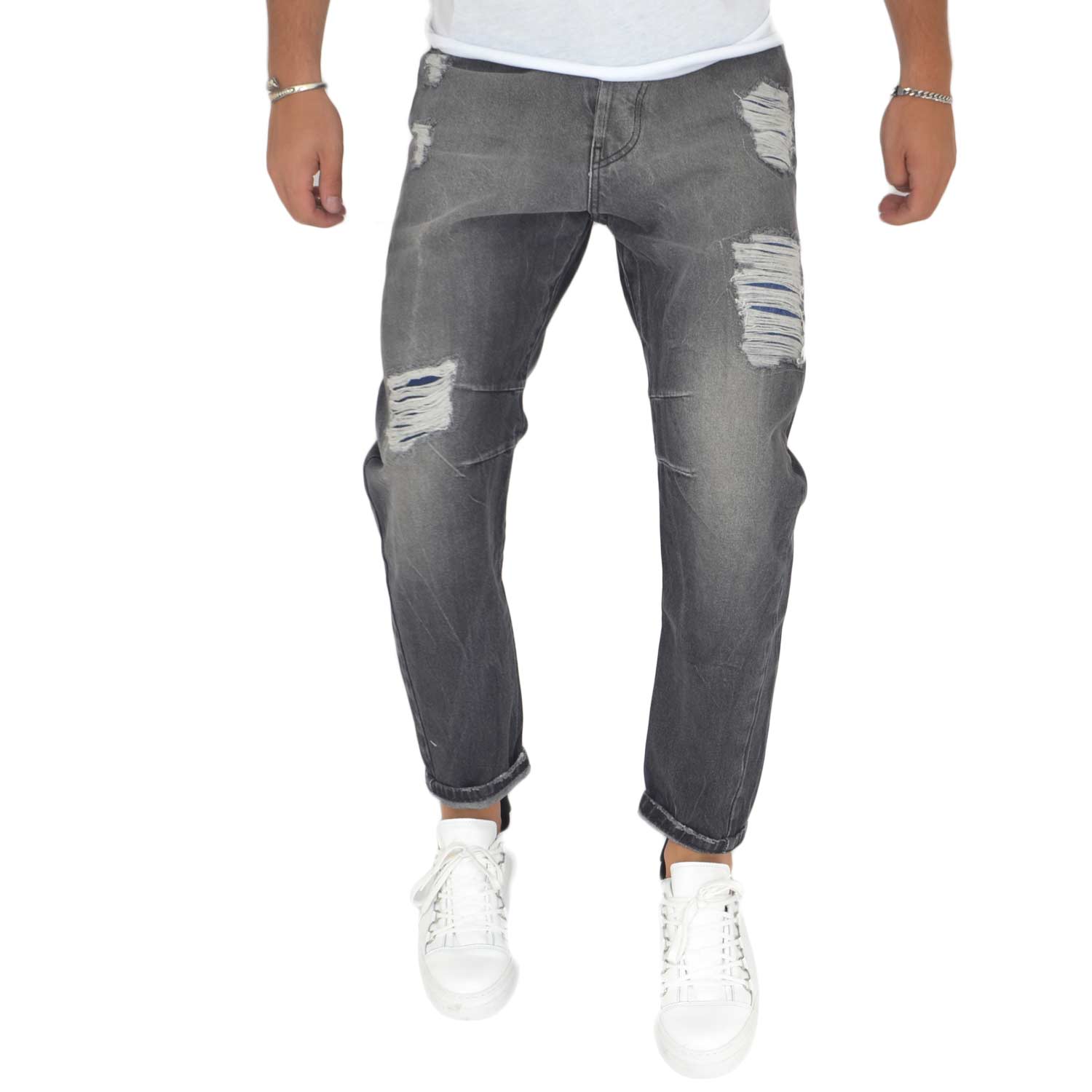 Pantaloni Jeans grigio scuro denim biker. Skinny fit.Chiusura con bottone e cerniera. strappi e tasche glamour.