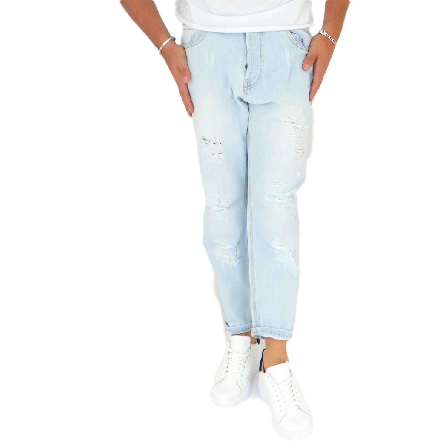 Pantaloni Jeans chiaro  denim biker Skinny fit.Chiusura con bottone e cerniera Cinque tasche. strappo moda 